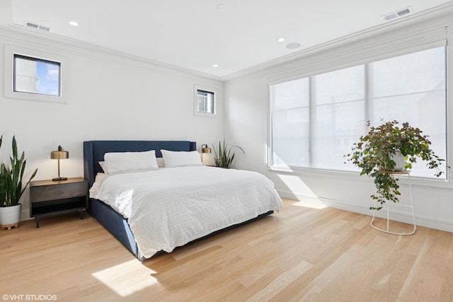 2014 N Winchester Ave, Chicago, IL 60614 - bedroom featuring crown molding, light wood-style flooring, and baseboards