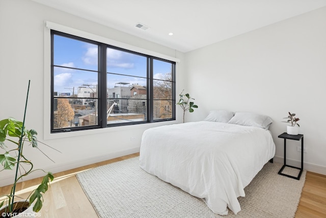 2014 N Winchester Ave, Chicago, IL 60614 - bedroom featuring light wood-type flooring and baseboards