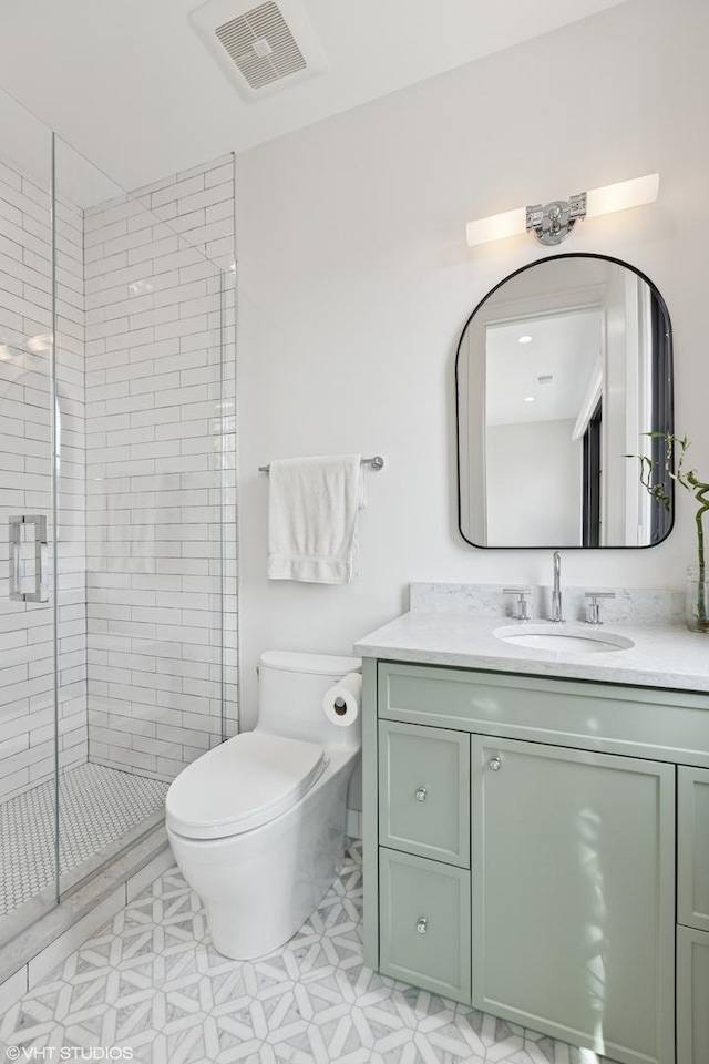 2014 N Winchester Ave, Chicago, IL 60614 - full bath featuring toilet, vanity, and a stall shower