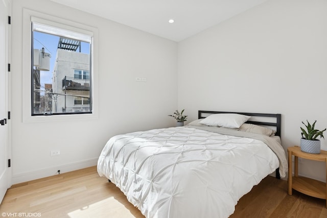 2014 N Winchester Ave, Chicago, IL 60614 - bedroom with wood finished floors, baseboards, and recessed lighting