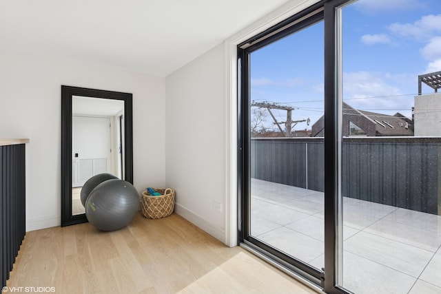 2014 N Winchester Ave, Chicago, IL 60614 - doorway to outside with wood finished floors and baseboards