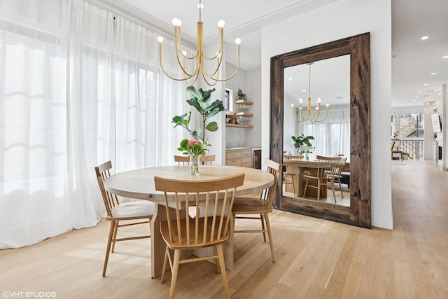2014 N Winchester Ave, Chicago, IL 60614 - dining area with a chandelier, light wood-style flooring, crown molding, and recessed lighting