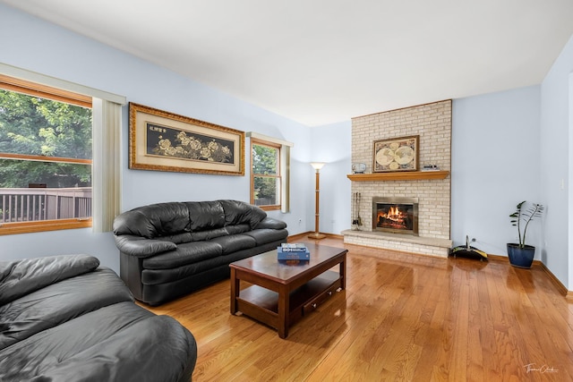 2048 Westbury Dr, Woodridge, IL 60517 - living area featuring light wood finished floors and a brick fireplace
