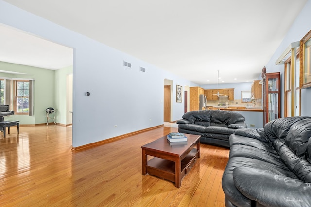 2048 Westbury Dr, Woodridge, IL 60517 - living room featuring light wood finished floors and recessed lighting