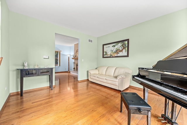 2048 Westbury Dr, Woodridge, IL 60517 - living area featuring light wood-style floors and a fireplace