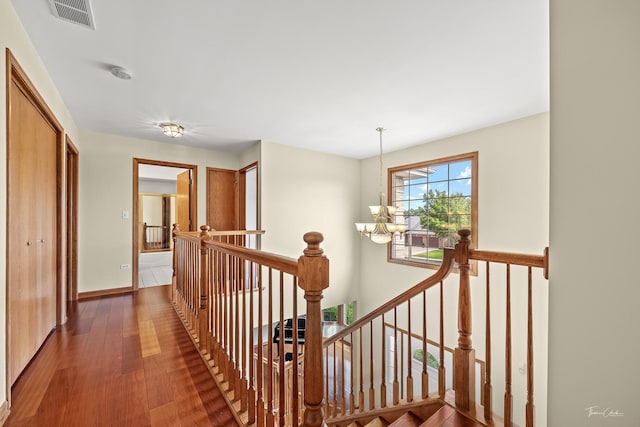 2048 Westbury Dr, Woodridge, IL 60517 - corridor with an upstairs landing, a chandelier, and wood finished floors