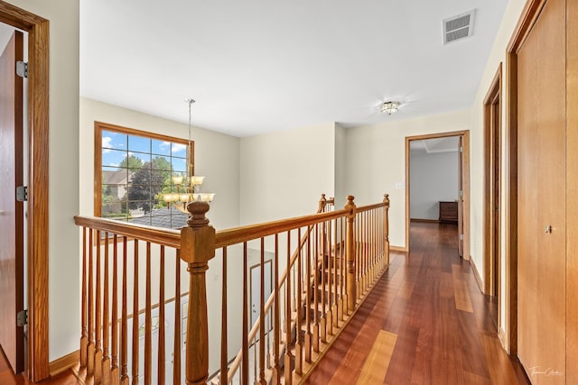 2048 Westbury Dr, Woodridge, IL 60517 - hall with an upstairs landing, wood finished floors, and a chandelier