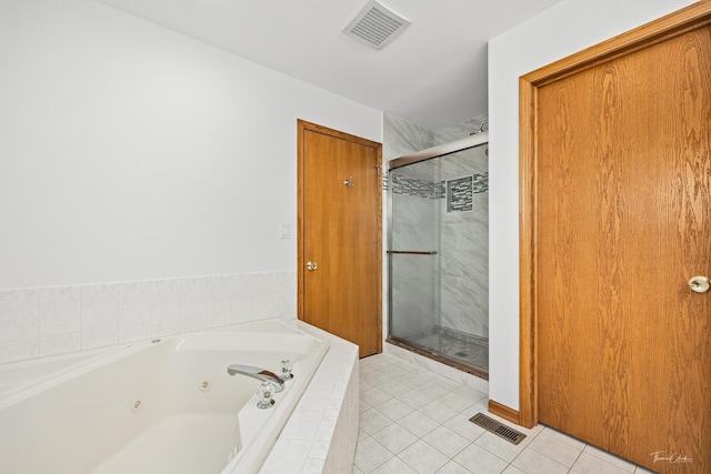 2048 Westbury Dr, Woodridge, IL 60517 - full bathroom with a tub with jets, a shower stall, and tile patterned flooring