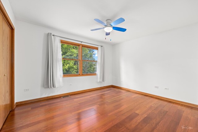 2048 Westbury Dr, Woodridge, IL 60517 - spare room with wood finished floors and ceiling fan