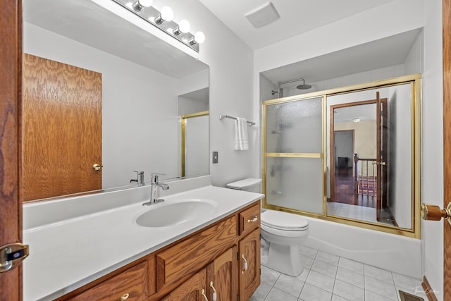 2048 Westbury Dr, Woodridge, IL 60517 - bathroom with tile patterned flooring, vanity, and combined bath / shower with glass door