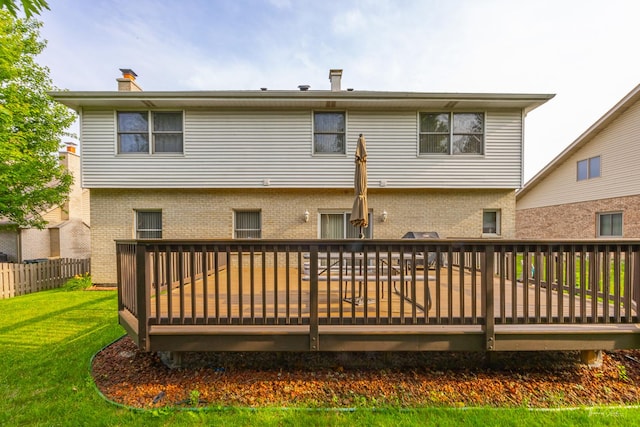 2048 Westbury Dr, Woodridge, IL 60517 - back of property with brick siding, a chimney, and a wooden deck