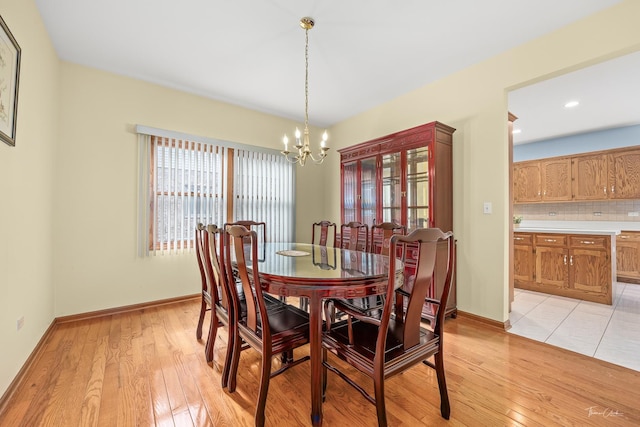 2048 Westbury Dr, Woodridge, IL 60517 - dining area featuring a chandelier, light wood-style flooring, and recessed lighting