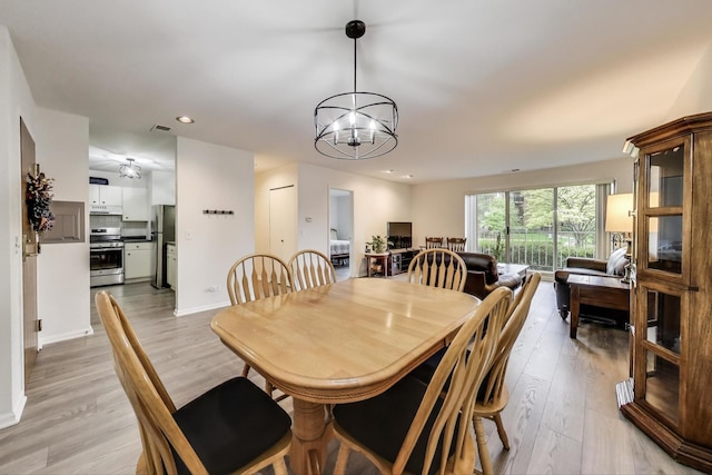 805 Leicester Rd Unit B105, Elk Grove Village, IL 60007 - dining space featuring a chandelier, light wood-style flooring, recessed lighting, and baseboards