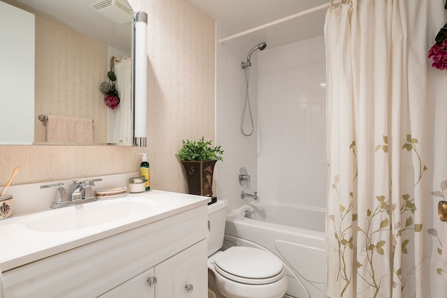 1700 Northfield Sq Unit C, Northfield, IL 60093 - bathroom featuring shower / tub combo with curtain, vanity, toilet, and wallpapered walls