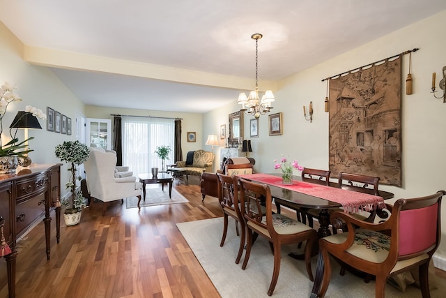 1700 Northfield Sq Unit C, Northfield, IL 60093 - dining area with wood finished floors and a chandelier