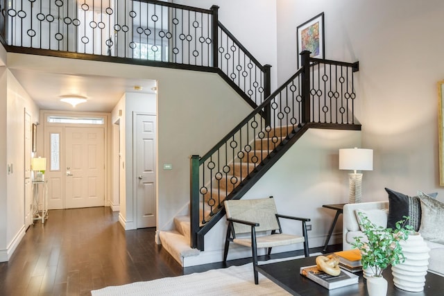 14613 Morningside Rd, Orland Park, IL 60462 - stairway featuring wood finished floors, baseboards, and a high ceiling
