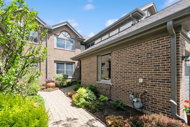 14613 Morningside Rd, Orland Park, IL 60462 - view of side of home with brick siding and a patio area