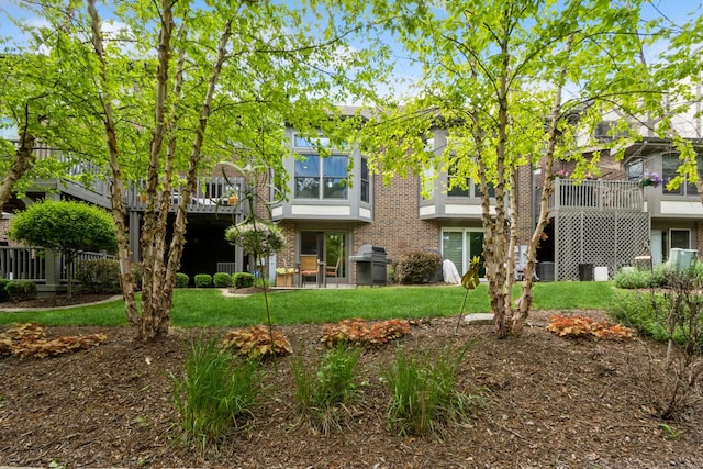 14613 Morningside Rd, Orland Park, IL 60462 - back of house with a yard and brick siding