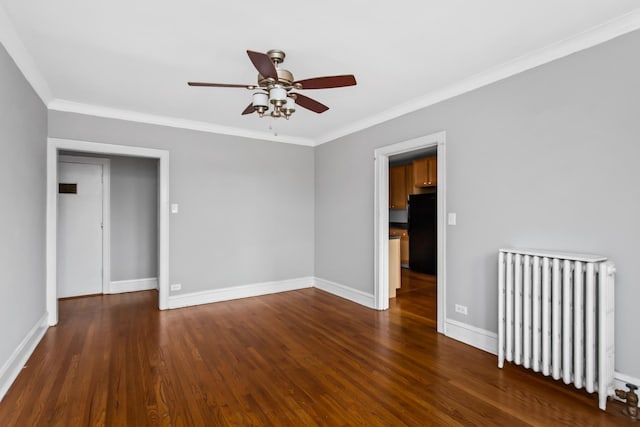 7444 Adams St Unit 3E, Forest Park, IL 60130 - spare room with radiator, ceiling fan, wood finished floors, and crown molding