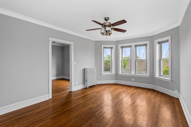 7444 Adams St Unit 3E, Forest Park, IL 60130 - spare room with radiator, plenty of natural light, wood-type flooring, a ceiling fan, and ornamental molding
