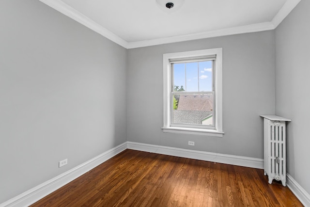 7444 Adams St Unit 3E, Forest Park, IL 60130 - empty room featuring radiator, crown molding, and dark wood-style floors