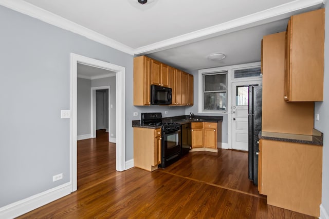 7444 Adams St Unit 3E, Forest Park, IL 60130 - kitchen featuring black appliances, dark wood-style flooring, dark countertops, and crown molding
