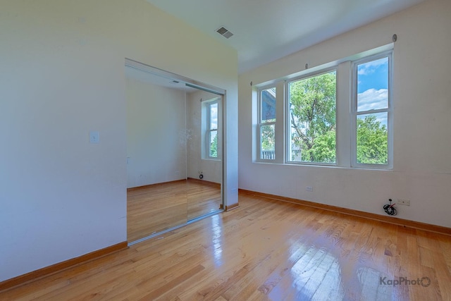 4137 S Prairie Ave Unit 3, Chicago, IL 60653 - unfurnished room featuring baseboards and light wood finished floors