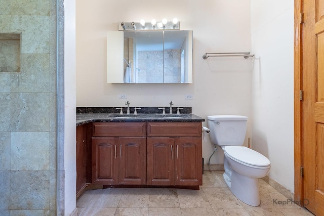 4137 S Prairie Ave Unit 3, Chicago, IL 60653 - full bathroom featuring toilet, vanity, and tile patterned flooring