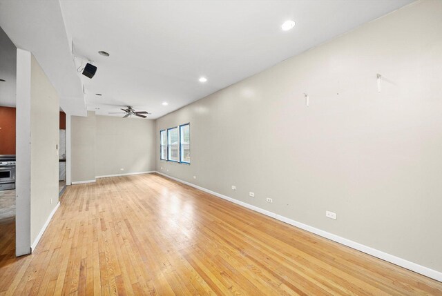 7809 S Peoria, Chicago, IL 60620 - spare room with a ceiling fan, light wood-type flooring, baseboards, and recessed lighting