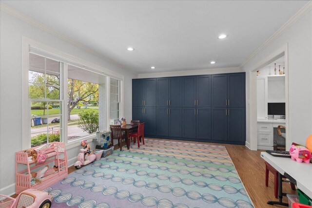1410 Wincanton Dr, Deerfield, IL 60015 - playroom featuring crown molding, light wood-style floors, and recessed lighting