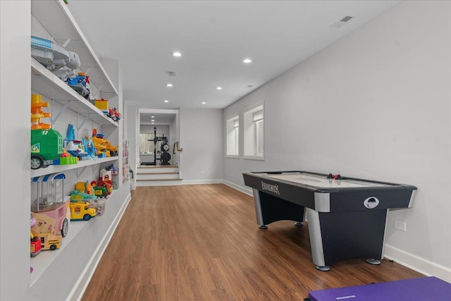1410 Wincanton Dr, Deerfield, IL 60015 - rec room with wood finished floors, baseboards, and recessed lighting