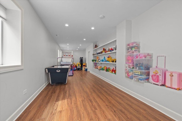 1410 Wincanton Dr, Deerfield, IL 60015 - playroom with wood finished floors, recessed lighting, baseboards, and built in shelves
