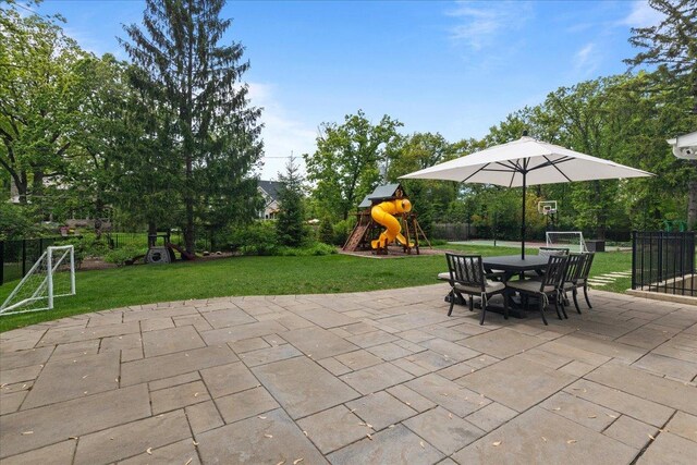 1410 Wincanton Dr, Deerfield, IL 60015 - view of patio / terrace featuring a playground and outdoor dining area