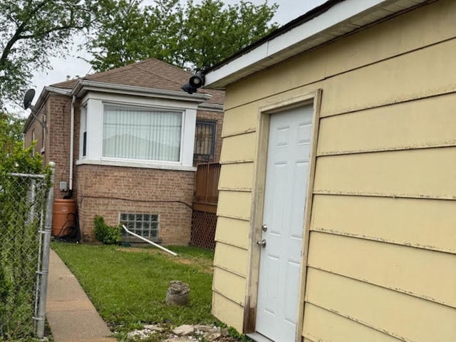 10153 S Saint Lawrence Ave, Chicago, IL 60628 - view of side of home featuring brick siding