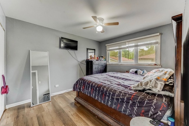 2816 E 127th St, Chicago, IL 60633 - bedroom with wood finished floors, baseboards, and a ceiling fan