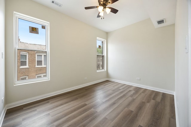 5622 S Laflin St, Chicago, IL 60636 - unfurnished room featuring wood finished floors, ceiling fan, and baseboards
