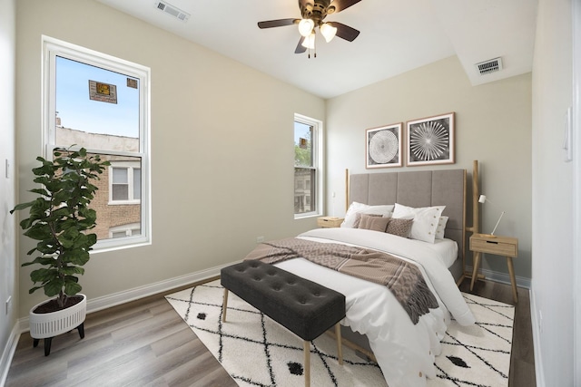 5622 S Laflin St, Chicago, IL 60636 - bedroom with wood finished floors, baseboards, and a ceiling fan