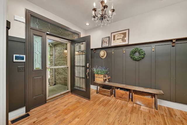480 Logue Cir, Seneca, IL 61360 - mudroom with a chandelier, light wood-style flooring, wainscoting, a decorative wall, and recessed lighting