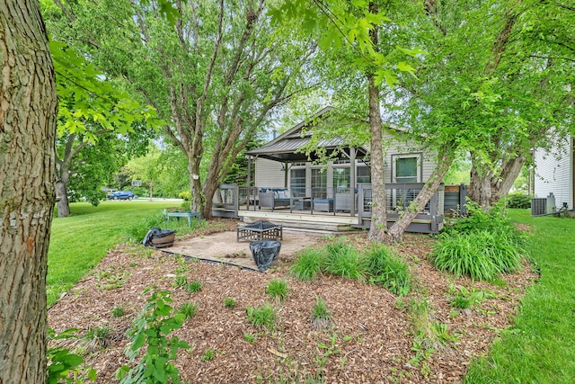 480 Logue Cir, Seneca, IL 61360 - view of green lawn featuring a gazebo, a wooden deck, central air condition unit, a patio, and outdoor lounge area