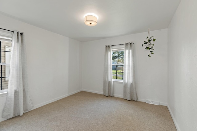3634 177th St, Lansing, IL 60438 - spare room with carpet flooring and baseboards