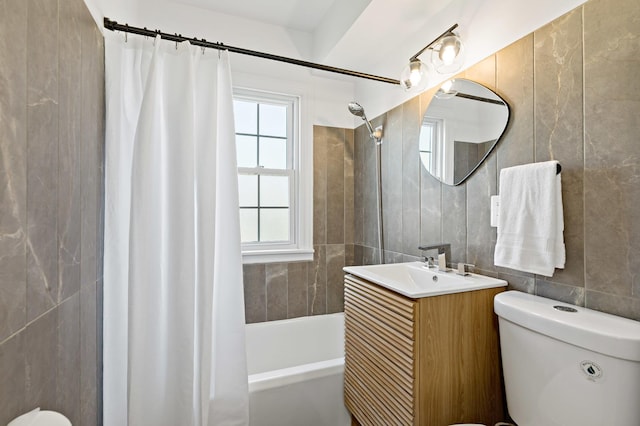 3634 177th St, Lansing, IL 60438 - bathroom featuring tile walls, toilet, shower / bath combo, vanity, and tasteful backsplash