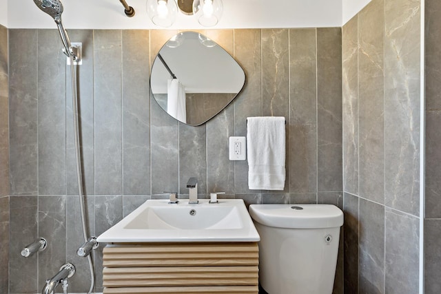 3634 177th St, Lansing, IL 60438 - bathroom featuring tile walls, vanity, and toilet
