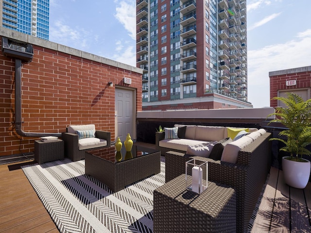 1733 S Prairie Ave, Chicago, IL 60616 - wooden deck with an outdoor living space