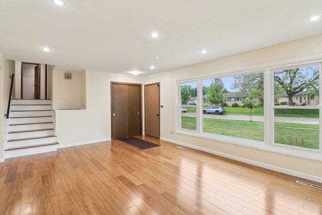 409 Wingate Dr, Schaumburg, IL 60193 - foyer entrance featuring baseboards, light wood finished floors, healthy amount of natural light, and recessed lighting