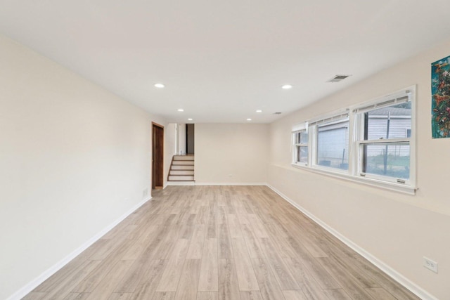 409 Wingate Dr, Schaumburg, IL 60193 - basement with light wood-style floors, baseboards, and recessed lighting