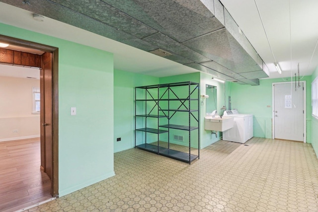 409 Wingate Dr, Schaumburg, IL 60193 - unfurnished room featuring independent washer and dryer, a smoke detector, and baseboards