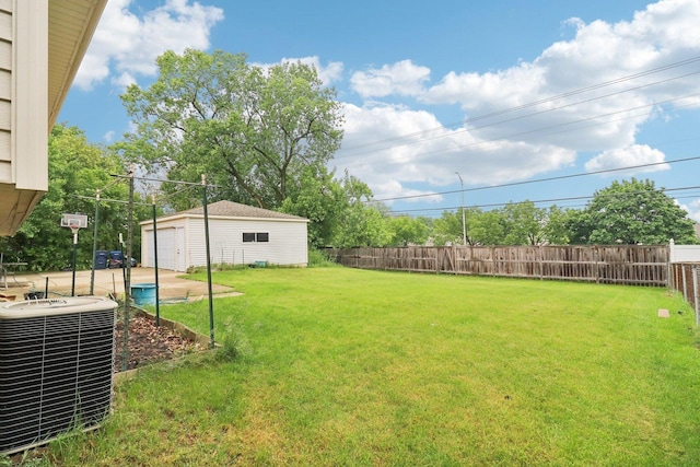 409 Wingate Dr, Schaumburg, IL 60193 - view of yard featuring central air condition unit, an outdoor structure, and a garage