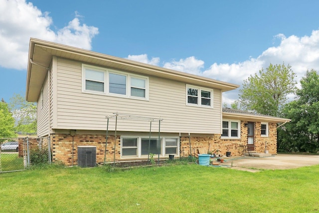 409 Wingate Dr, Schaumburg, IL 60193 - rear view of property featuring brick siding, a patio, and cooling unit