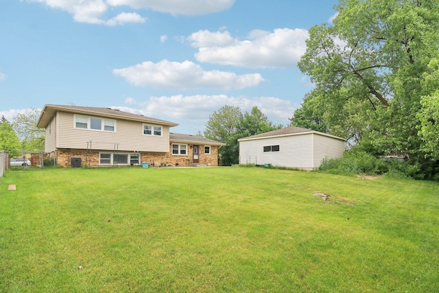 409 Wingate Dr, Schaumburg, IL 60193 - back of property featuring brick siding and central AC unit