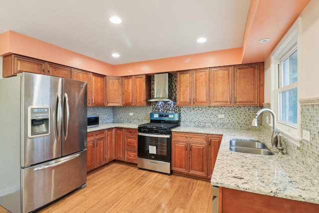409 Wingate Dr, Schaumburg, IL 60193 - kitchen with stainless steel appliances, wall chimney exhaust hood, a sink, brown cabinets, and recessed lighting